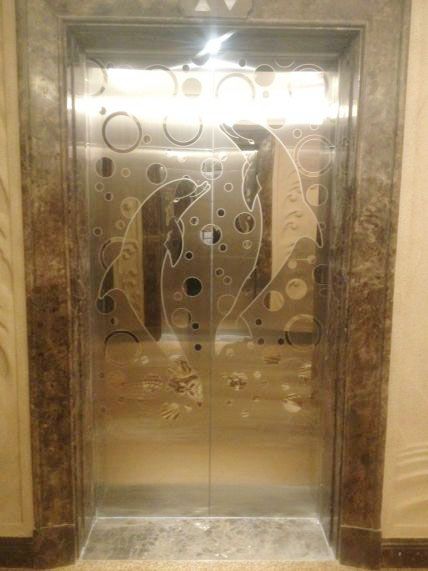 电梯电镀海豚图案装饰包板
